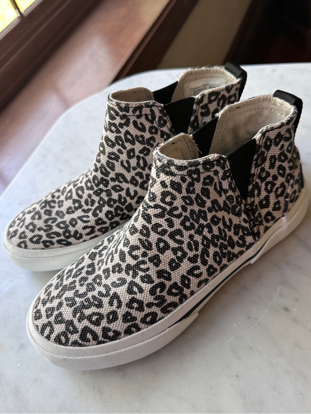 Sperry Leopard Print Slip-On High Tops in Cream and Black